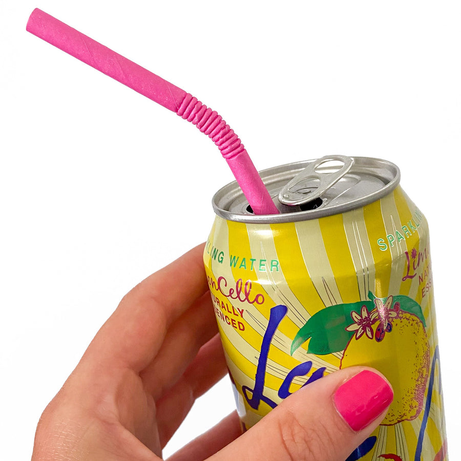 Bright pink, bendy paper straw from The Pursuit of Cocktails. Biodegradable, compostable, and recyclable eco-friendly paper straws.