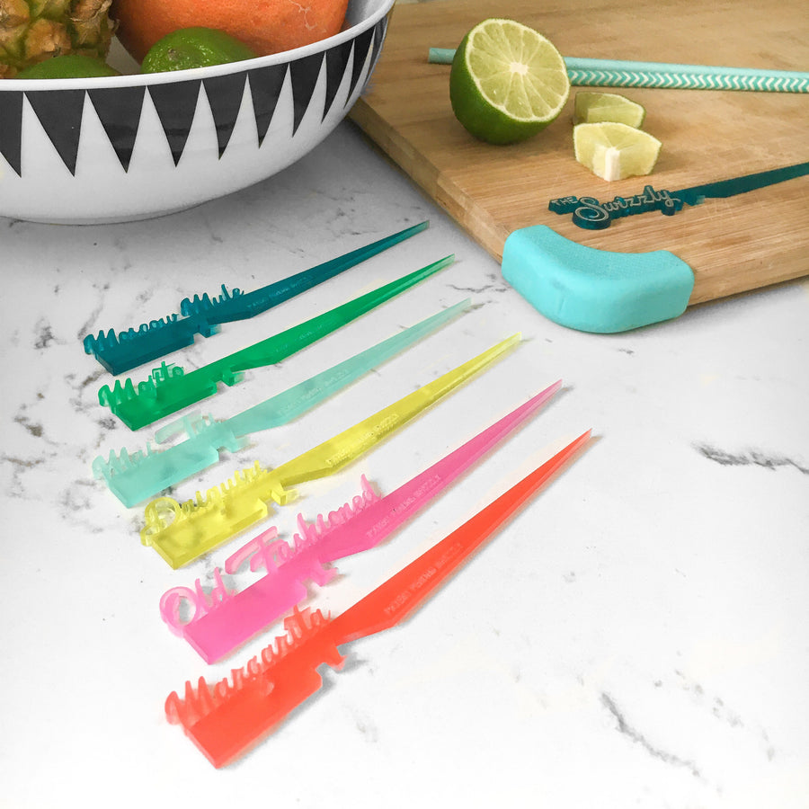 Classic cocktail themed swizzle stick drink markers with patented notch system for securing garnish to the rim of most glasses