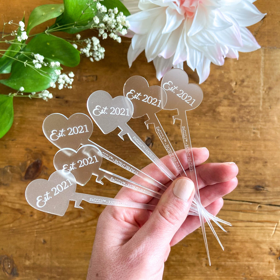 Wedding cocktail pick set for 2021 weddings with optional personalized wedding favors. Heart shaped wedding Swizzly drink marker and cocktail pick bar accessory