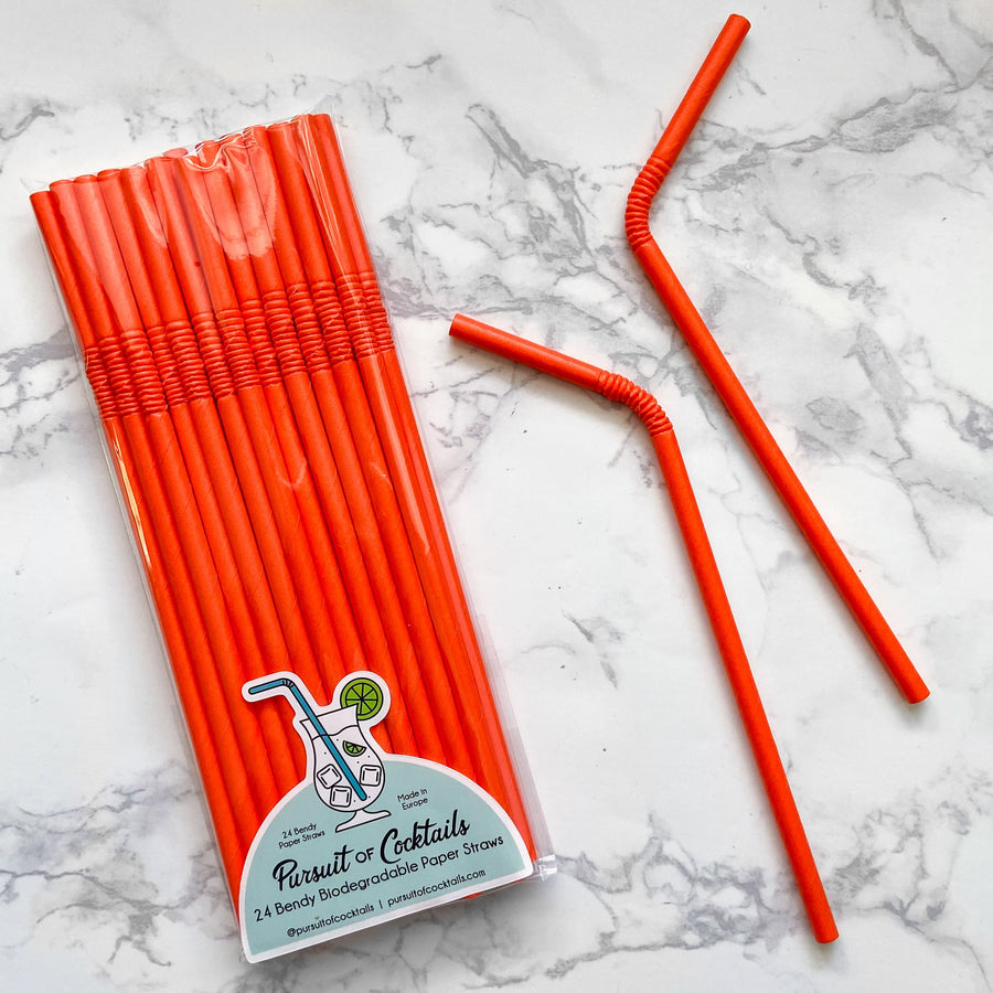 Bright orange bendy paper straws from The Pursuit of Cocktails. Colorful paper party supplies.